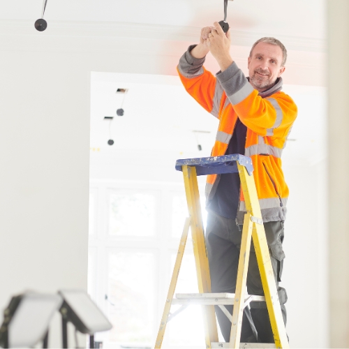 Electrician installing 